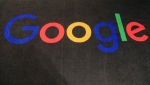  The logo of Google is displayed on a carpet at the entrance hall of Google France in Paris, on Nov. 18, 2019. (AP Photo/Michel Euler, File)
