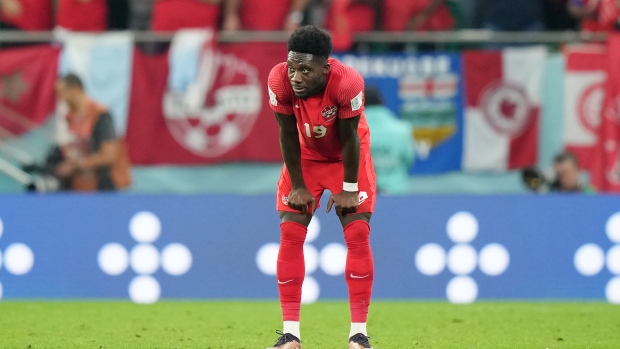 Canada forward Alphonso Davies (19) reacts after a loss to Morocco in group F World Cup soccer action at the Al Thumama Stadium in Doha, Qatar on Thursday, December 1, 2022. THE CANADIAN PRESS/Nathan Denette