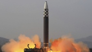 FILE - This photo distributed by the North Korean government shows what it says a test-fire of a Hwasong-17 intercontinental ballistic missile (ICBM), at an undisclosed location in North Korea on March 24, 2022. Independent journalists were not given access to cover the event depicted in this image distributed by the North Korean government. The content of this image is as provided and cannot be independently verified. Korean language watermark on image as provided by source reads: "KCNA" which is the abbreviation for Korean Central News Agency. (Korean Central News Agency/Korea News Service via AP, File)