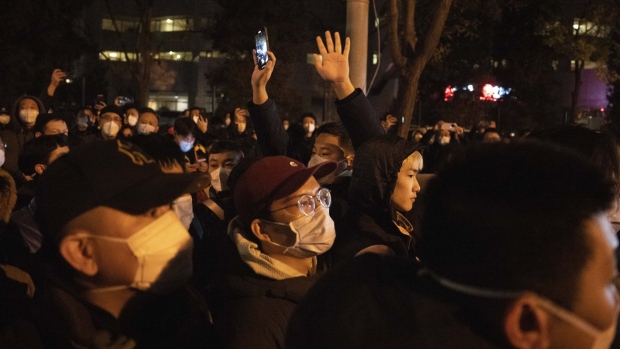 Protesters march in Beijing, Sunday, Nov. 27, 2022