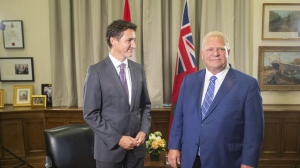 Prime Minister Justin Trudeau meets with Ontario Premier Doug Ford at the Queen's Park Legislature in Toronto on Tuesday, Aug. 30, 2022. Prime Minister Justin Trudeau is scheduled to make an announcement this afternoon in southwestern Ontario about electric vehicle manufacturing. THE CANADIAN PRESS/Chris Young