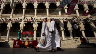 A man and a boy walk at the Souq Waqif market in Doha, Qatar on Sunday, December 4, 2022. Qatar has been no ordinary FIFA World Cup. More like a one-of-a-kind tournament in a one-of-a-kind country. With eight stadiums within one hour of each, either in or around Doha, the men’s soccer showcase is a far cry from previous editions spread across one country or more. THE CANADIAN PRESS/Nathan Denette