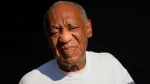 File-This June 30, 2021, file photo shows Bill Cosby reacting outside his home in Elkins Park, Pa., after being released from prison. (AP Photo/Matt Slocum, File) 