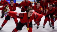 Canada's Marie-Philip Poulin (29) celebrates with her gold medal after the women's gold medal hockey game at the 2022 Winter Olympics, Thursday, Feb. 17, 2022, in Beijing.Poulin has won the 2023 Northern Star Award, making her the first female hockey player to claim the honour given annually to Canada's athlete of the year. THE CANADIAN PRESS/AP-Matt Slocum
