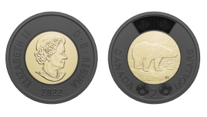 The Royal Canadian Mint has issued a $2 circulation coin, shown in a handout photo, featuring a black outer ring to honour Her Late Majesty Queen Elizabeth II's service to Canada during her historic 70-year reign. THE CANADIAN PRESS/HO-Royal Canadian Mint 