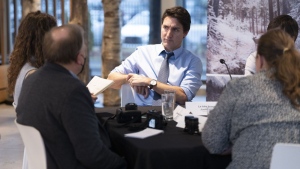 Prime Minister Justin Trudeau listens to a question from environment journalists during a roundtable discussion in Montreal on Wednesday, Dec. 7, 2022. Trudeau says he believes at least 120 countries are now on board the COP15 nature summit target to protect nearly one-third of land and marine coastlines by 2030. THE CANADIAN PRESS/Paul Chiasson