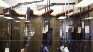 Hunting rifles are seen on display in a glass case at a gun and rifle store in downtown Vancouver, B.C., Wednesday, Sept. 15, 2010. Seven members of a parliamentary committee studying the Liberal gun bill have requested two special meetings to hear from witnesses on the government's proposed definition of an assault-style firearm. THE CANADIAN PRESS/Jonathan Hayward