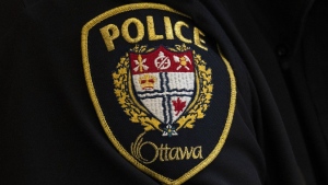 A close-up of an Ottawa Police officer’s badge is seen on Thursday, April 28, 2022 in Ottawa. Ottawa police say Supt. Mark Patterson, who is 53, is charged with sex assault, sex assault including abusing a position of trust, and breach of trust following an investigation by Ontario Provincial Police.THE CANADIAN PRESS/Adrian Wyld