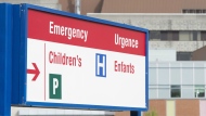 A sign directing visitors to the emergency department is shown at the Children's Hospital of Eastern Ontario (CHEO) Friday, May 15, 2015 in Ottawa. THE CANADIAN PRESS/Adrian Wyld