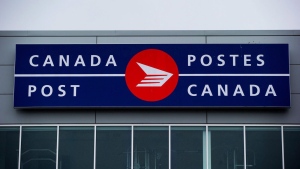 The Canada Post logo is seen on the outside the company's Pacific Processing Centre, in Richmond, B.C., on Thursday June 1, 2017. Canadians who choose to send parcels over the holidays may be surprised by the steep surcharge on domestic shipping this season due to the high price of diesel. THE CANADIAN PRESS/Darryl Dyck