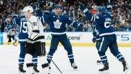 Toronto Maple Leafs' Pierre Engvall (centre) celebrates scoring as Los Angeles Kings' Carl Grundstrom skates past during second period NHL hockey action in Toronto, on Thursday, December 8, 2022.THE CANADIAN PRESS/Chris Young 