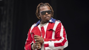 Rapper Gunna performs at the Wireless Music Festival, Crystal Palace Park, London, England, on Sep. 10, 2021. Gunna, who was arrested earlier in the year along with fellow rapper Young Thug and more than two dozen other people, pleaded guilty in Atlanta on Wednesday, Dec. 14, 2022, to a racketeering conspiracy charge, according to a statement released by his attorney. (AP Photo/Scott Garfitt, File)