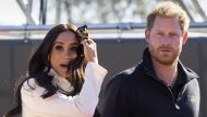 Prince Harry and Meghan Markle, Duke and Duchess of Sussex visit the track and field event at the Invictus Games in The Hague, Netherlands, Sunday, April 17, 2022. (AP Photo/Peter Dejong, File)