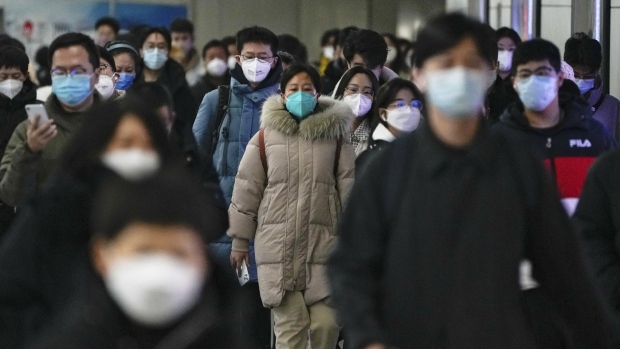 Masked commuters in Beijing
