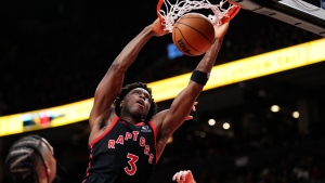 Toronto Raptors forward O.G. Anunoby (3) dunks against the Memphis Grizzlies during second half NBA basketball action in Toronto on Thursday, December 29, 2022. THE CANADIAN PRESS/Frank Gunn