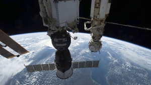 The photo provided by NASA shows the Soyuz MS-22 crew ship pictured on Oct. 8, 2002, in the foreground docked to the Rassvet module as the International Space Station orbited 264 miles above Europe. In the background, is the Prichal docking module attached to the Nauka multipurpose laboratory module. Russian space corporation Roscosmos said Wednesday, Jan. 11, 2023 that it will launch a new spacecraft to take some of the International Space Station's crew back to Earth after their capsule was damaged and leaked coolant.(NASA via AP)
