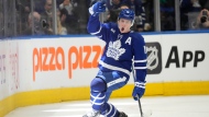 Toronto Maple Leafs right wing Mitchell Marner (16) celebrates after scoring on Nashville Predators during third period NHL action in Toronto on Wednesday January 11, 2023. Marner scored on a power play with 1:15 left in regulation to defeat the Predators 2-1. THE CANADIAN PRESS/Frank Gunn 