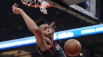 Toronto Raptors forward Scottie Barnes (4) completes the dunk during first half NBA basketball action against the Charlotte Hornets in Toronto on Thursday, Jan. 12, 2023. THE CANADIAN PRESS/Frank Gunn