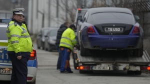 Romanian traffic policeman with seized vehicle