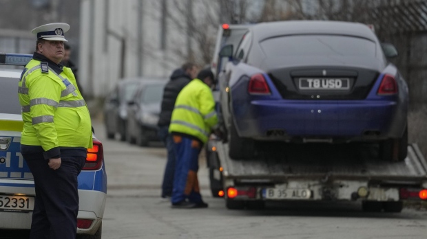 Romanian traffic policeman with seized vehicle