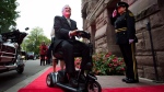 Outgoing Ontario Lieutenant-Governor David Onley is saluted while arriving for his last full day in office at Queen's Park in Toronto on Monday, September 22, 2014. THE CANADIAN PRESS/Darren Calabrese