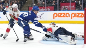 Toronto Maple Leafs forward William Nylander (88) scores the game-winning goal against Florida Panthers goaltender Sergei Bobrovsky (72) as forward Carter Verhaeghe (23) looks on during the overtime period of NHL hockey action in Toronto on Tuesday, January 17, 2023. THE CANADIAN PRESS/Nathan Denette
