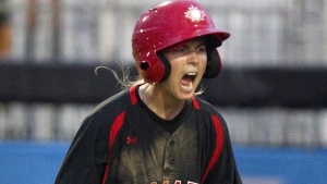 Canada's Ashley Stephenson reacts after scoring during fifth inning women's baseball action against Venezuela at the Pan American Games in Toronto on Saturday July 25, 2015. Stephenson, a long-time player and coach with Canada's women's baseball team, is joining the Toronto Blue Jays' organization as a coach with the Vancouver Canadians. THE CANADIAN PRESS/Fred Thornhill