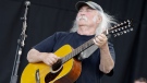 FILE - David Crosby of the band Crosby, Stills and Nash, performs at Glastonbury Festival in England, on June 27, 2009. Crosby, the brash rock musician who evolved from a baby-faced harmony singer with the Byrds to a mustachioed hippie superstar and an ongoing troubadour in Crosby, Stills, Nash & (sometimes) Young, has died at age 81. His death was reported Thursday, Jan. 19, 2023, by multiple outlets. (AP Photo/Joel Ryan), File)