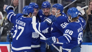 Toronto Maple Leafs centre Auston Matthews (34) celebrates his goal against the Winnipeg Jets with teammates during second period NHL hockey action in Toronto on Thursday Jan. 19, 2023. THE CANADIAN PRESS/Nathan Denette