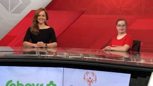 Special Olympics Canada athlete Carly Bryden (right) sits with TSN anchor Kate Beirness during a fundraiser in 2019 in this handout photo provided January 20, 2023. Since the COVID-19 pandemic Bryden has become non-verbal and only communicated with her family by text message. THE CANADIAN PRESS/HO-Special Olympics Canada *MANDATORY CREDIT*