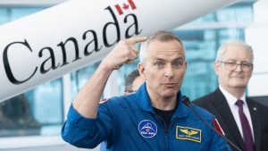 Former astronaut and MP Marc Garneau, right, looks on as Astronaut David Saint-Jacques speaks during a government of Canada announcement supporting commercial space launches, at the Canadian Space Agency in Longueuil, Que., Friday, January 20, 2023. THE CANADIAN PRESS/Graham Hughes