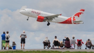 An Air Canada rouge jet takes off from Trudeau Airport in Montreal, Thursday, June 30, 2022. THE CANADIAN PRESS/Graham Hughes