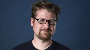 FILE - Justin Roiland poses for a portrait to promote the television series "Rick and Morty" on day two of Comic-Con International, July 21, 2017, in San Diego. Roiland, who created the animated series “Rick and Morty” and provides the voices of the two title characters, is awaiting trial on charges of felony domestic violence against a former girlfriend. A criminal complaint obtained Thursday, Jan. 12, 2023, by The Associated Press from prosecutors in Orange County, Calif., detailed the charges against him. (Photo by Chris Pizzello/Invision/AP, File)