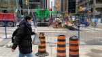 Crews work to repair a major water main break at the intersection of University Avenue and King Street Monday January 23, 2023. (Joshua Freeman /CP24) 