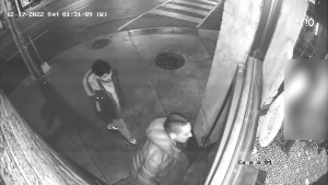 Police are looking for two suspects seen in this surveillance video image after a shot was fired at a downtown establishment.