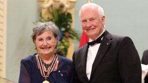 Actress and teacher Viola Leger receives the Lifetime Artistic Achievement Award for Theatre shakes hands with Governor General David Johnston during a ceremony of the Governor General's Performing Arts Awards at Rideau Hall in Ottawa, May 31, 2013. THE CANADIAN PRESS/Fred Chartrand