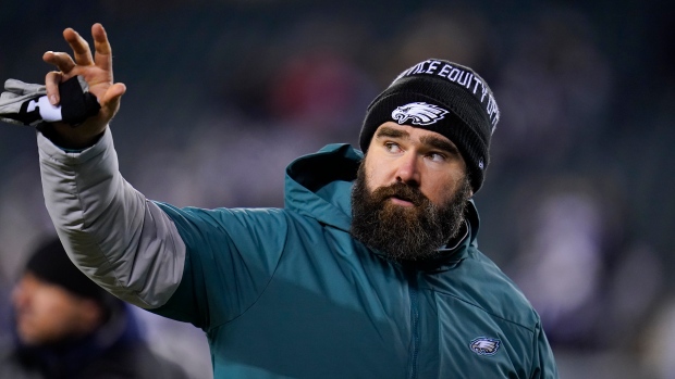 Philadelphia Eagles center Jason Kelce waves to fans as he walks off the field after an NFL football game against the Dallas Cowboys, Saturday, Jan. 8, 2022, in Philadelphia. (AP Photo/Julio Cortez) 