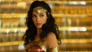 This image released by Warner Bros. Entertainment shows Gal Gadot in a scene from "Wonder Woman 1984." James Gunn and Peter Safran, co-chairmen and CEOs of DC Studios, debuted their plans for a revamped and newly unified DC Universe of films and television series, including a new Superman film in 2025, a Wonder Woman prequel and a Batman movie that won't star Robert Pattinson. (Clay Enos/Warner Bros. via AP)