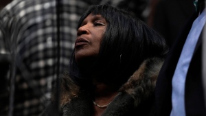 RowVaughn Wells, mother of Tyre Nichols, pauses as she listens during a news conference about the death of her son Tuesday, Jan. 31, 2023, at Mason Temple in Memphis, Tenn. A funeral service for Nichols, who died after being beaten by Memphis police officers during a traffic stop, is scheduled to be held on Wednesday. (AP Photo/Jeff Roberson)