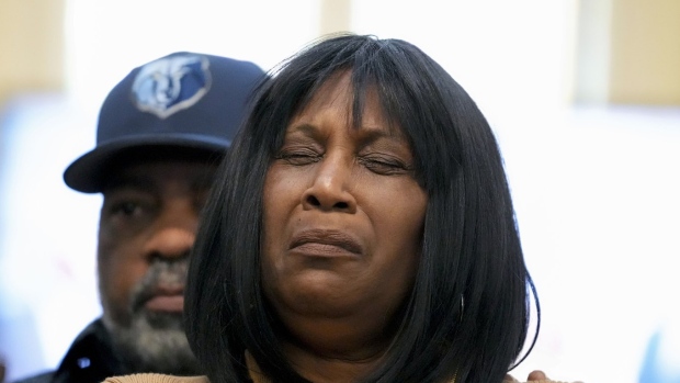 FILE - RowVaughn Wells, mother of Tyre Nichols, who died after being beaten by Memphis police officers, is comforted by Tyre's stepfather Rodney Wells, at a news conference with civil rights Attorney Ben Crump in Memphis, Tenn., Jan. 27, 2023. The parents of Tyre Nichols will attend President Joe Biden's State of the Union address next week. (AP Photo/Gerald Herbert, File)