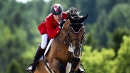 Ian Millar of Canada competes in the equestrian team jumping during the Pan American Games in Caledon, Ont., on Thursday, July 23, 2015. Ian Millar has been named the newest technical advisor of the national show jumping team, Equestrian Canada announced Thursday.THE CANADIAN PRESS/Nathan Denette