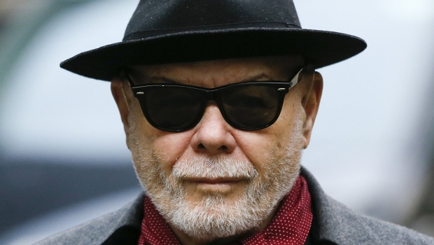 British pop star Gary Glitter, whose real name is Paul Gadd, arrives at Southwark Crown Court in London, on Feb. 4, 2015. Former pop star Gary Glitter was released from prison in England on Friday Feb. 3, 2023 after serving half of a 16-year prison sentence for sexually abusing three young girls in the 1970s. (AP Photo/Kirsty Wigglesworth, File)
Kirsty Wigglesworth
