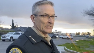 In this frame grab from video provided by the Tulare Count Sheriff's Office, Sheriff Mike Boudreaux speaks to the media near the scene of a fatal shooting in Visalia, Calif., on Jan. 16, 2023. Boudreaux said Friday, Feb. 3, 2023, that two gang members suspected in the massacre of six people last month in central California have been arrested, one after a gunbattle.(Tulare County Sheriff's Office via AP, File)