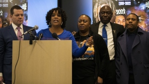 Karen Wells, mother of Amir Locke, speaks about a civil lawsuit against the City of Minneapolis for the police shooting death of Amir Locke during a no-knock warrant during a press conference on Friday, Feb. 3, 2023. The 22-year-old Locke, who was Black, was sleeping on a couch in his cousin’s apartment when authorities entered without knocking as part of an investigation into a homicide in which Locke was not a suspect. (Stephen Maturen /Minnesota Public Radio via AP)