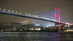 VF Tanker 9 oil tanker ship, which departed from Russian Temryuk port on December 12, sails under the 15 July Martyrs Bridge at the Bosphorus strait in Istanbul, Turkey, Thursday, Dec. 15, 2022. The federal Finance Department says Canada is joining forces with its fellow G-7 countries plus Australia to expand caps on Russian oil to include seaborn petroleum products from that country. THE CANADIAN PRESS/AP-Emrah Gurel