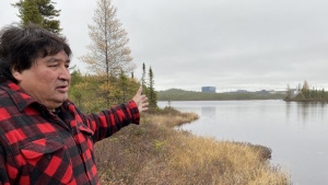 Trapper Freddy Jolly stands near the Whabouchi mine in Nemaska, in the James Bay region, Quebec on October 20, 2022. THE CANADIAN PRESS/Stephane Blais