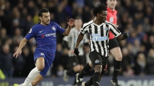 Chelsea's Pedro, left, and Newcastle United's Christian Atsu vie for the ball during the English Premier League soccer match between Chelsea and Newcastle United at Stamford Bridge stadium in London, on, Jan. 12, 2019. Former Chelsea and Newcastle forward Christian Atsu is missing and believed to be trapped under rubble following the powerful earthquake that struck Turkiye on Monday and left more than 2,500 people dead. The Ghana international plays for Turkish club Hatayspor and a club spokesman says he is thought to be in a building that was destroyed. (AP Photo/Matt Dunham, File)