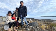 Heather House and some of her children are seen in Chisasibi, near the James Bay region, Quebec on October 23, 2022. THE CANADIAN PRESS/Stephane Blais