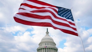 The U.S. Flag flies at the Capitol in Washington, Monday, Feb. 6, 2023. President Joe Biden on Tuesday night will stand before a joint session of Congress for the first time since voters in the midtem elections handed control of the House to Republicans. (AP Photo/Mariam Zuhaib)