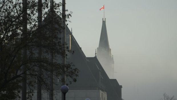 Parliament Hill and the Supreme Court of Canada are shrouded in fog in Ottawa, on Friday, Nov 4, 2022. The federal government is being urged to follow through with its commitment to develop a Black Canadian justice strategy.THE CANADIAN PRESS/Sean Kilpatrick
